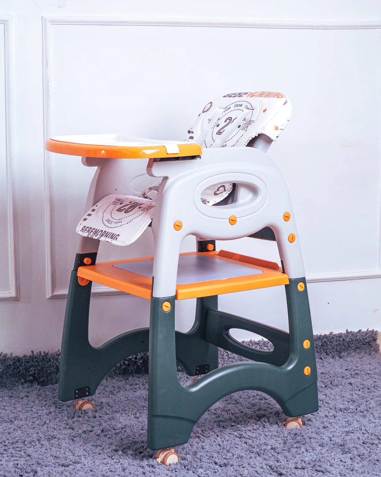 3 In 1 High Feeding Chair 5 Side Profile Of The Secure Baby Feeding Chair With The Tray Attached And The 5-Point Harness Visible.