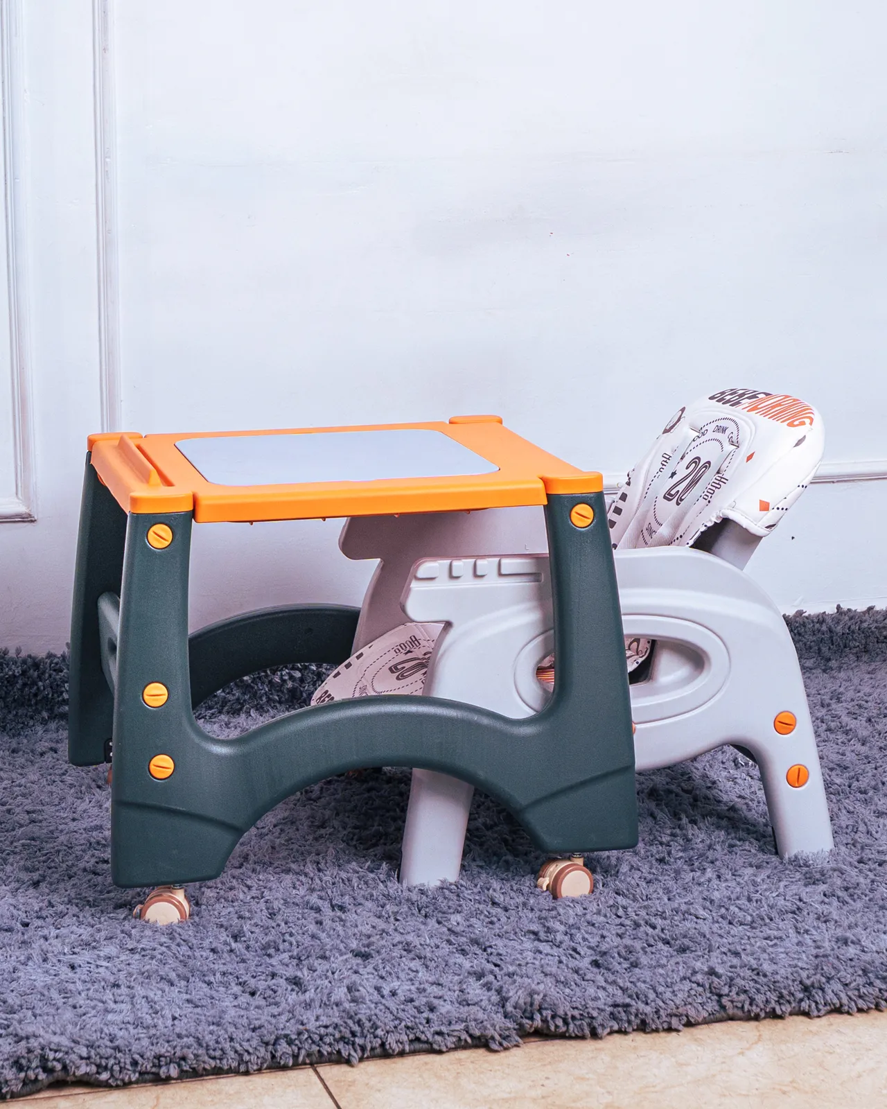 3 In 1 High Feeding Chair 12 Showing The Product Converted Into The Low Toddler Chair And Table Set On A Rug.