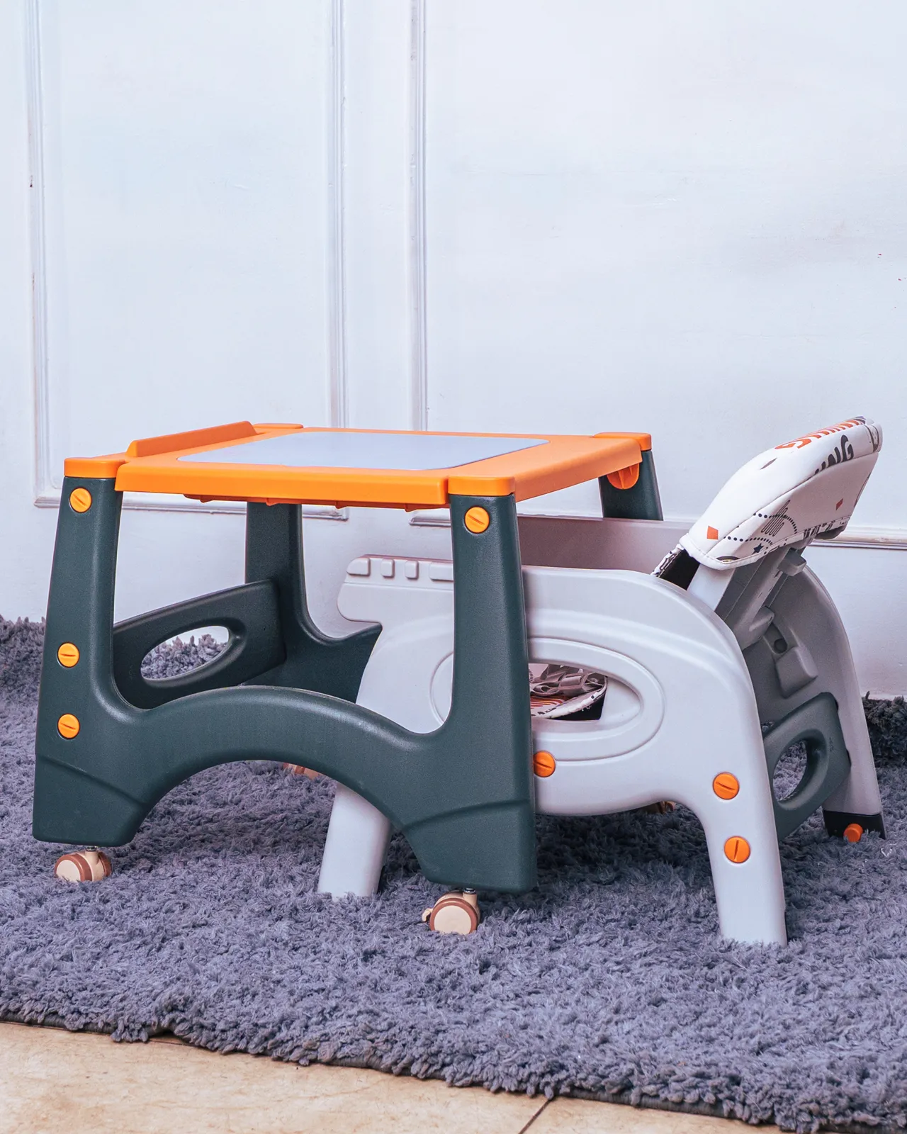 3 In 1 High Feeding Chair 2 Close-Up Of The Easy-To-Clean, Removable Food-Grade Tray With Orange Accents.