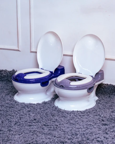 Two identical toddler potty chairs, one in blue and one in gray, from Zawadi Baby Shop Nairobi.