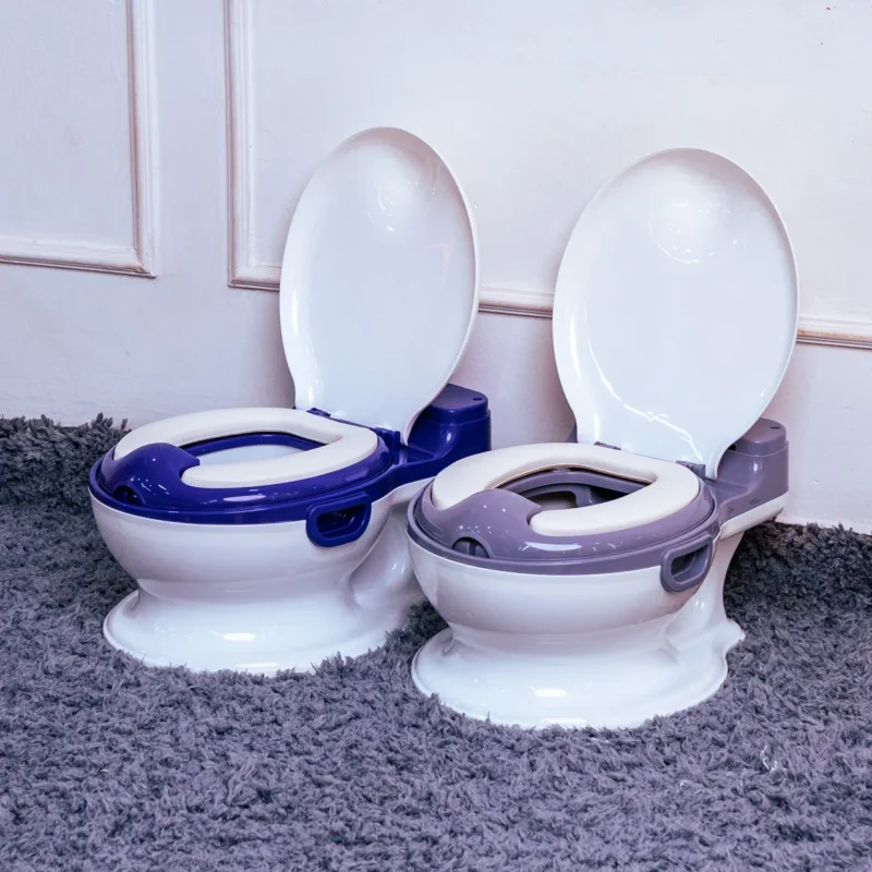 Two identical toddler potty chairs, one in blue and one in gray, from Zawadi Baby Shop Nairobi.
