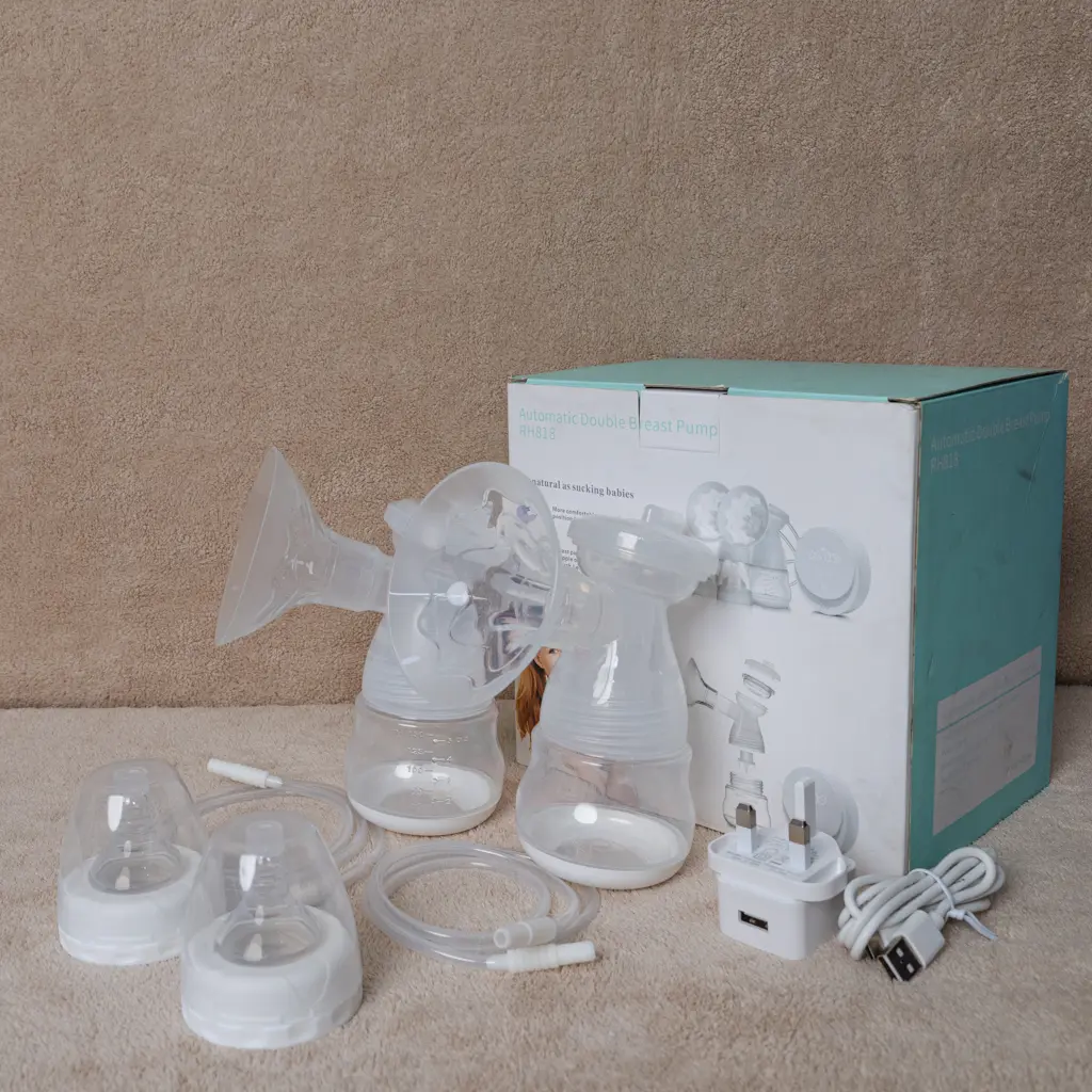 Beige 6-piece silicone baby weaning feeding set with dinosaur bib displayed at Zawadi Baby Shop Nairobi.