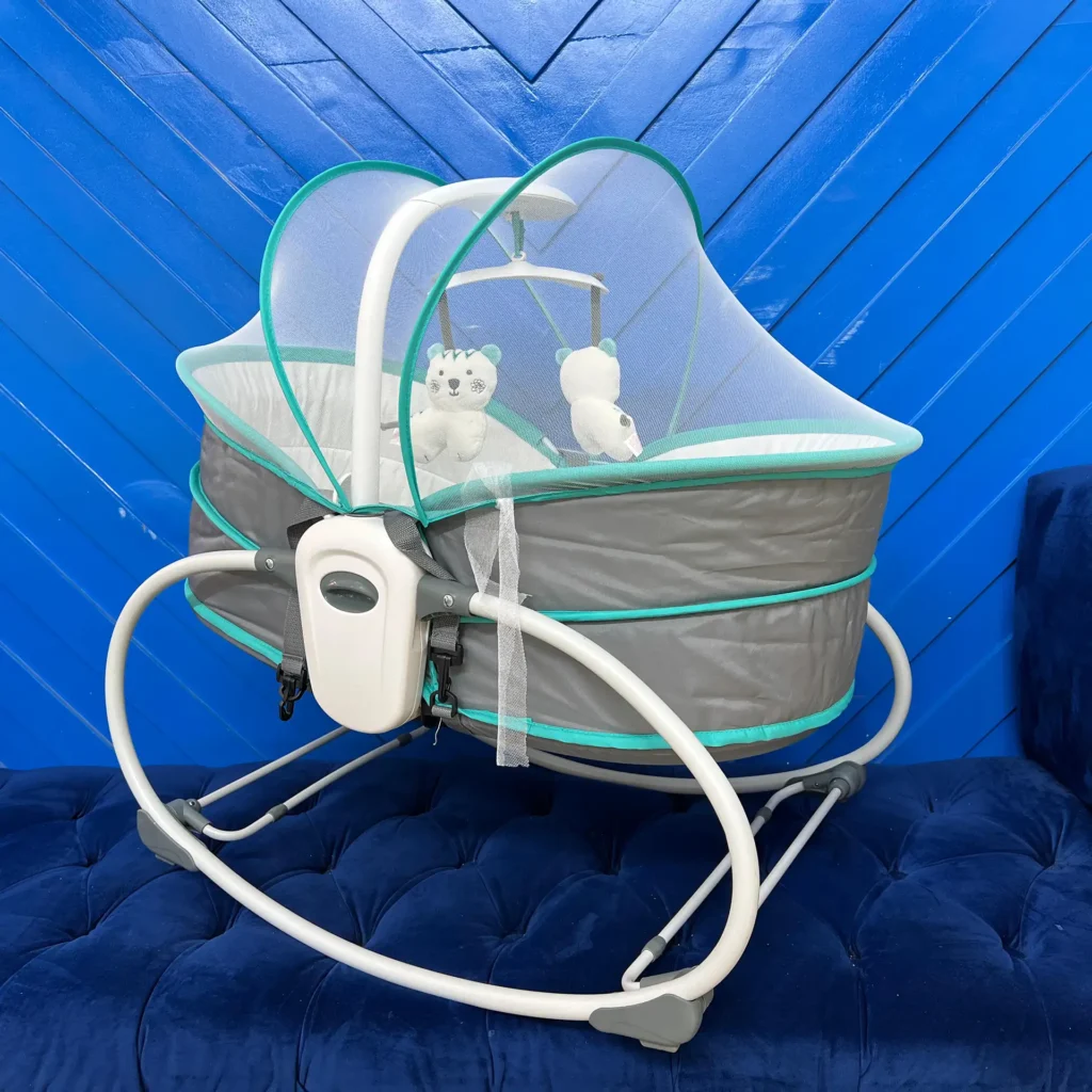 A 5-in-1 rocking bassinet featuring a sturdy frame, breathable mesh canopy, plush toys, and a smooth rocking mechanism for comfort and convenience.