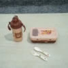 Lunch Box &Amp; Water Bottle Set 8 Brown And Beige Kids Lunch Set Featuring A Rectangular Lunch Box, A Handled Sippy Cup-Style Water Bottle With A Pink Bear Design (Resembling Lotso From Toy Story) And Pop-Up Straw, And A White Plastic Fork And Spoon With Pattern, Displayed On A Light Surface.