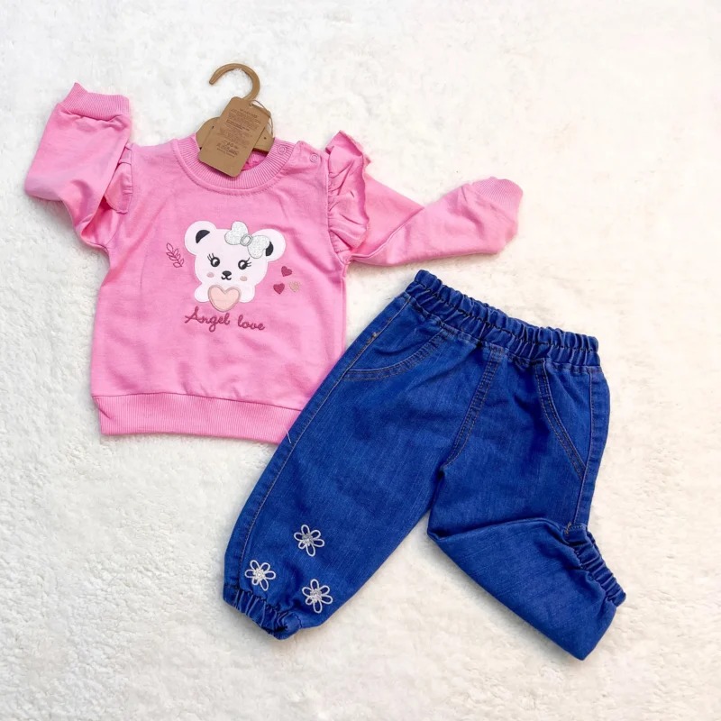 Pink baby outfit with a bear and "Angel Love" print on the sweatshirt, paired with blue denim pants decorated with embroidered white flowers at the cuff.