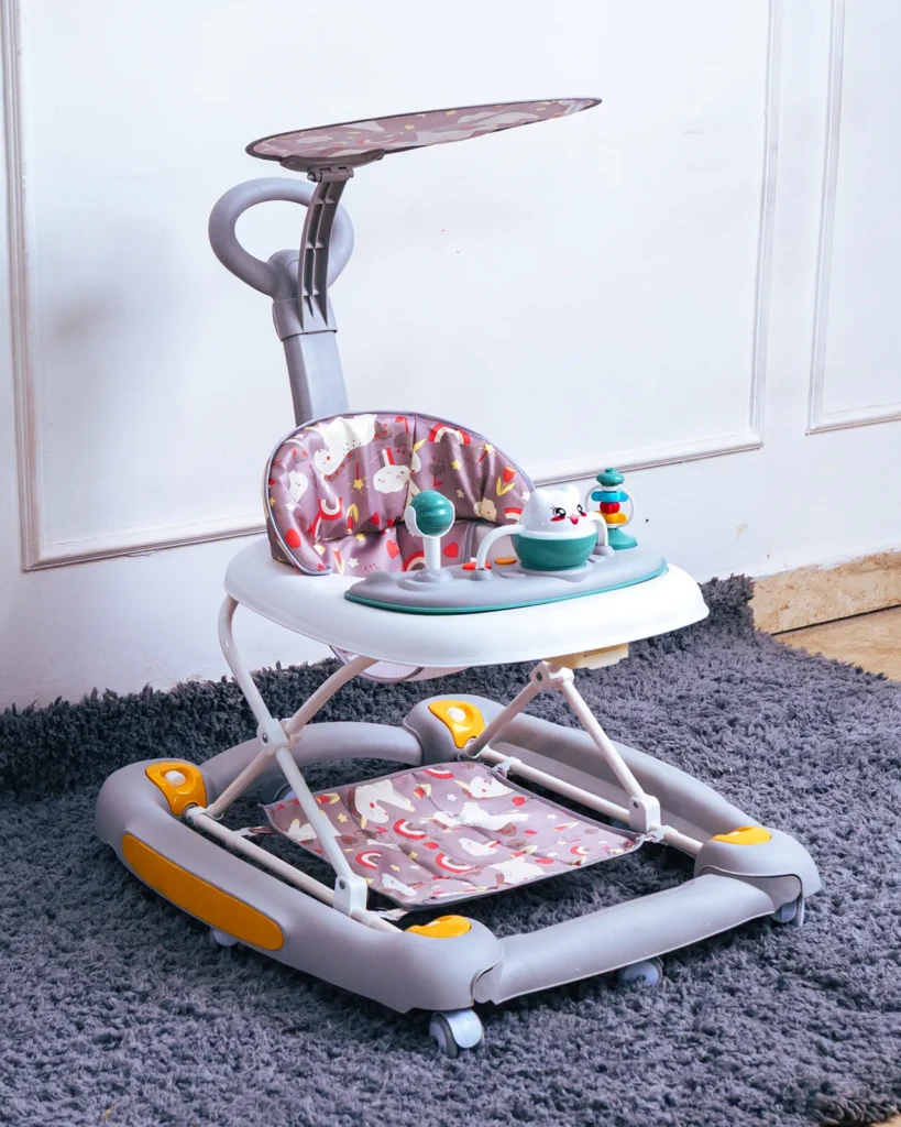 Close-up of the Child Walker activity tray and the colorful, padded seat fabric.