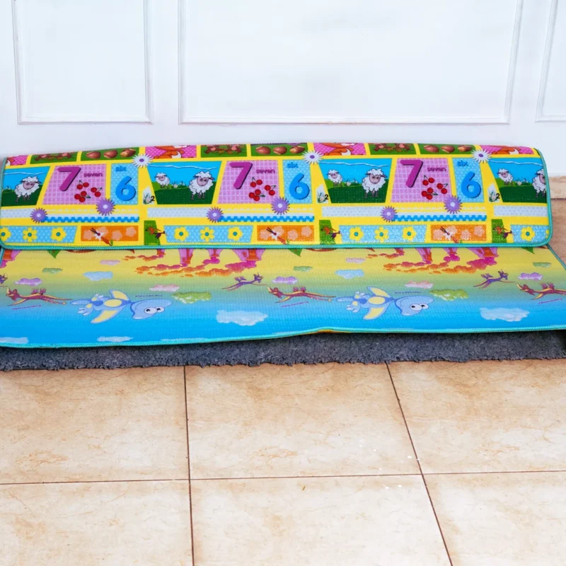 Floor mat for playpen featuring the reversible crocodile and underwater scene side.