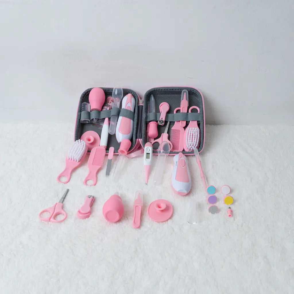 15 Pcs Grooming Kit With Electric Nail Trimmer 9 Pink 15 Pcs Baby Grooming Kit With Electric Nail Trimmer And Dinosaur Case At Zawadi Baby Shop Nairobi.