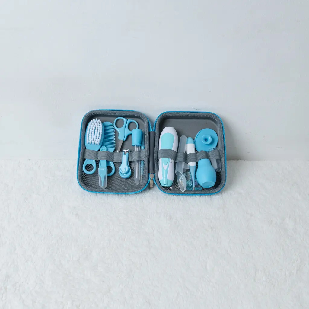 15 Pcs Grooming Kit With Electric Nail Trimmer 8 Blue 15 Pcs Baby Grooming Kit With Electric Nail Trimmer And Dinosaur Case At Zawadi Baby Shop Nairobi.