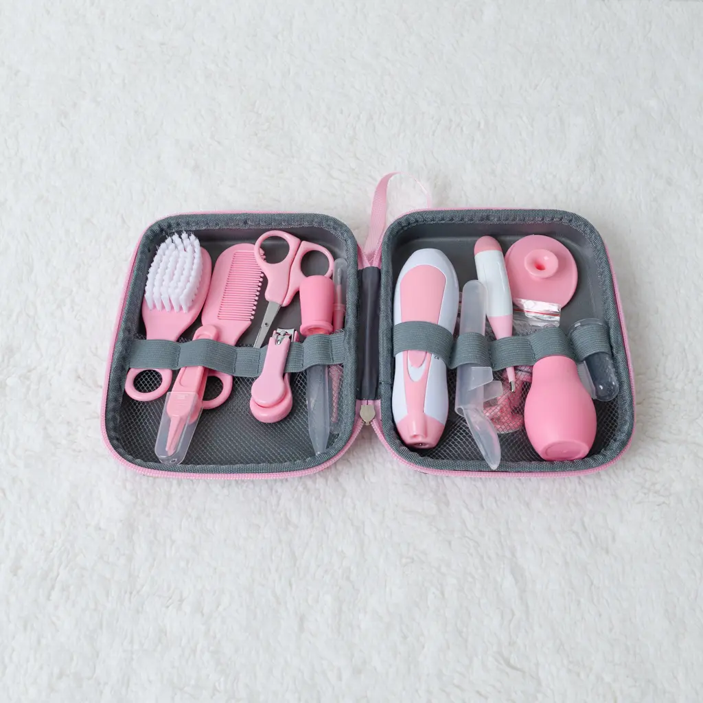 15 Pcs Grooming Kit With Electric Nail Trimmer 6 Pink 15 Pcs Baby Grooming Kit With Electric Nail Trimmer And Dinosaur Case At Zawadi Baby Shop Nairobi.