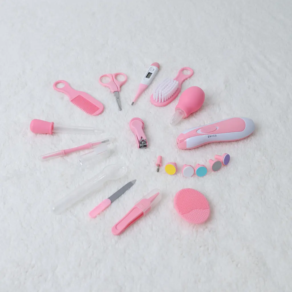 15 Pcs Grooming Kit With Electric Nail Trimmer 5 Pink 15 Pcs Baby Grooming Kit With Electric Nail Trimmer And Dinosaur Case At Zawadi Baby Shop Nairobi.