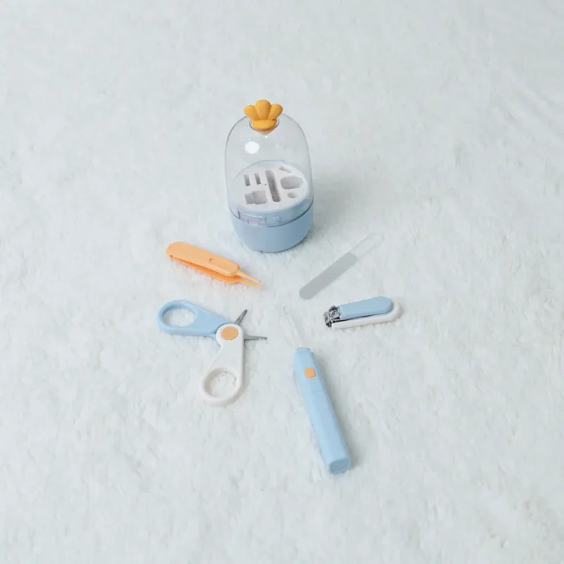 Blue capsule baby grooming kit with illuminated ear pick from Portable grooming kit.jpg at Zawadi Baby Shop.