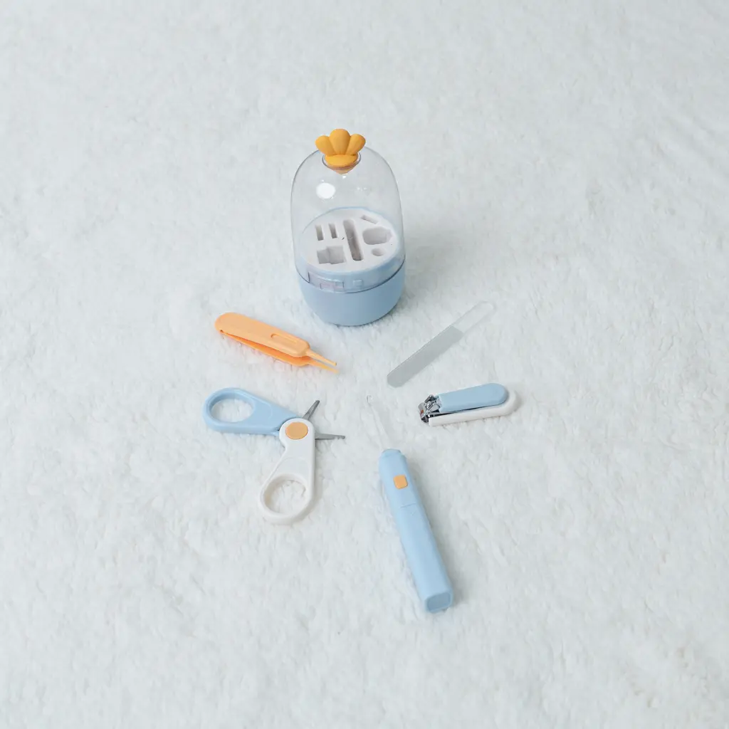 Blue capsule baby grooming kit with illuminated ear pick from Portable grooming kit.jpg at Zawadi Baby Shop.