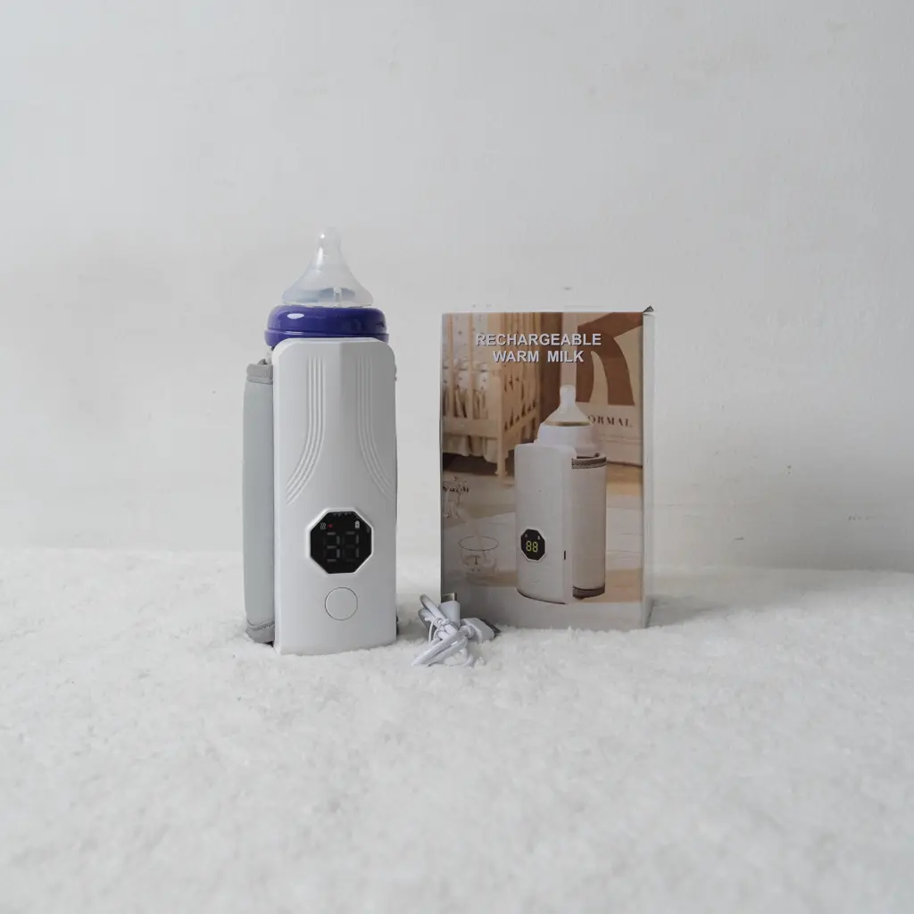 Portable electric milk warmer with digital screen from Instant portable electric milk warmer at Zawadi Baby Shop.