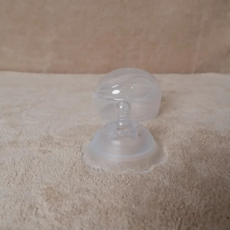 Clear soft silicone nipple shield and transparent circular protective case at Zawadi Baby Shop Nairobi.