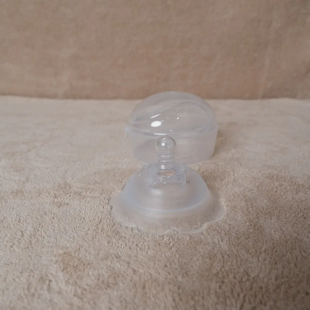 Clear soft silicone nipple shield and transparent circular protective case at Zawadi Baby Shop Nairobi.