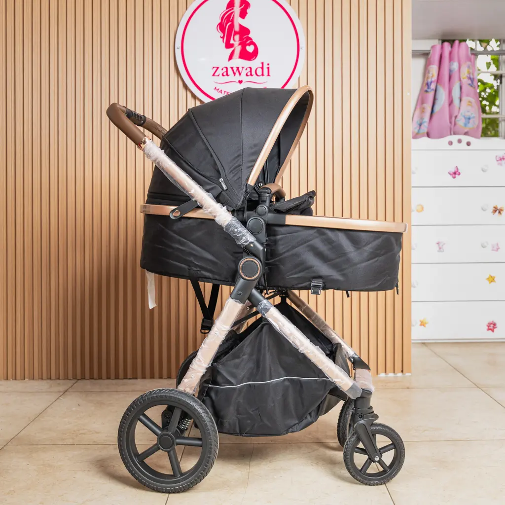 Black 2-in-1 baby stroller in bassinet mode with rose-gold frame at Zawadi Baby Shop Nairobi.