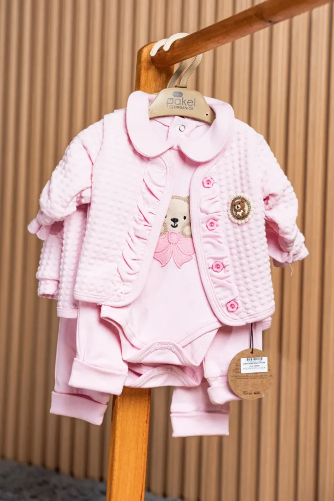 Pink 3 piece newborn set with quilted cardigan and bodysuit at Zawadi Baby Shop Nairobi.