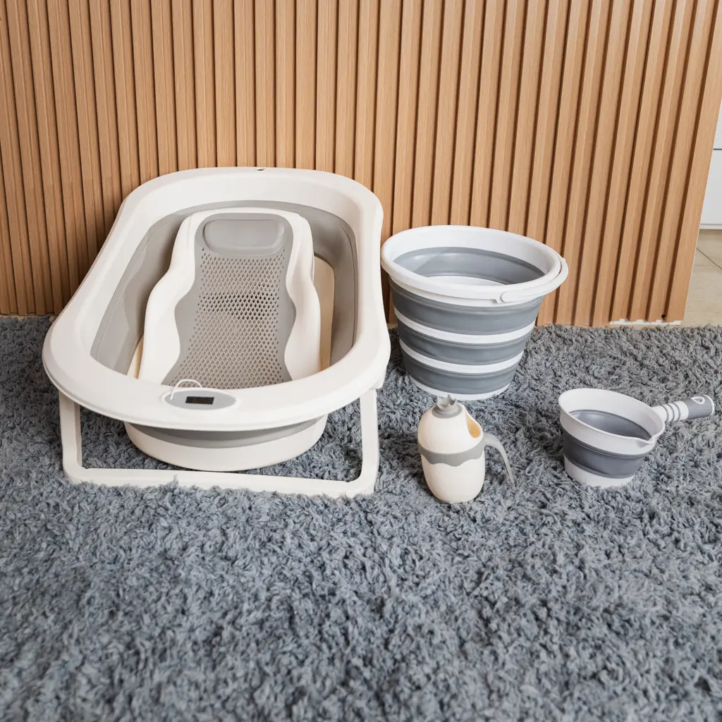 Foldable baby bath set with tub, mesh support, bucket, jug and scoop at Zawadi Baby Shop Nairobi.