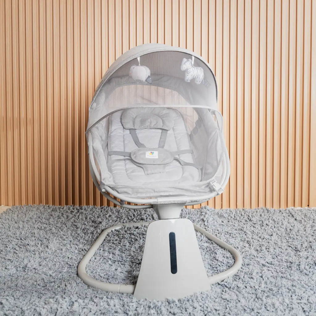 Mastela baby swing in light grey with canopy and mosquito net at Zawadi Baby Shop Nairobi.