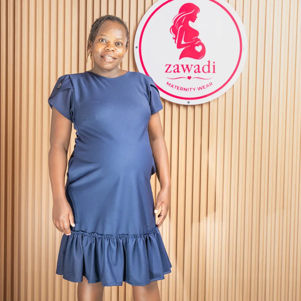 Button Back Maternity Dress With Sleeve Detail 4 Navy Maternity Dress With Ruffle Hem And Side Pockets (Photo 4) At Zawadi Baby Shop Nairobi.