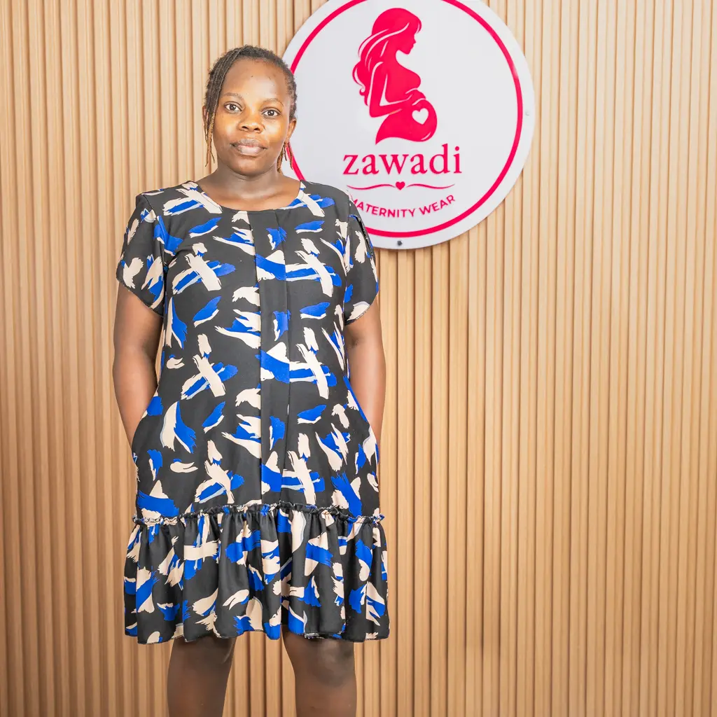 Printed blue and white maternity dress with ruffle hem at Zawadi Baby Shop Nairobi.